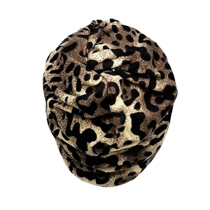 Versatile leopard print knit scarf and slouchy beanie hat for cold weather styling