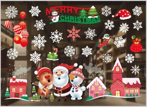Detail of Christmas window stickers featuring Santa, reindeer, and snowflakes in red and green