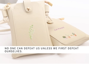 Detail of cream PU phone bags with green leaf and cactus prints and snap closure