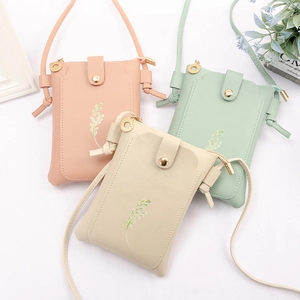 Mini crossbody phone bags for women in pink, mint, and white with leaf embroidery