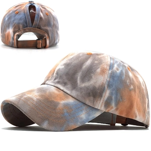 Tie-dye cotton ponytail baseball cap with orange blue marbling and adjustable back buckle
