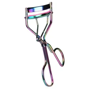 Macro shot of rainbow-plated eyelash curler with soft pink silicone protective pads