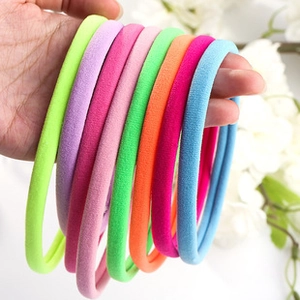 Detailed view of colorful high-elasticity nylon hair ties with soft towel texture