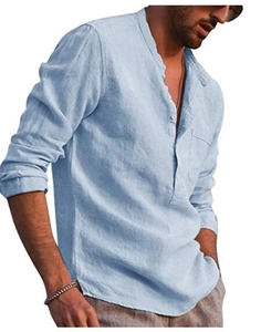 Detail of light blue linen shirt featuring a grandad collar and front chest pocket