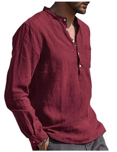 Detail of burgundy linen shirt featuring a small stand collar and single chest pocket