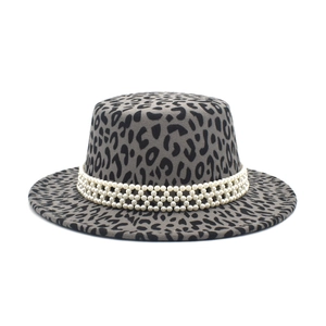 Detail of grey leopard print fedora hat featuring triple row pearl band decoration