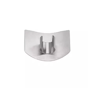 Professional polished stainless steel finger guard for cutting vegetables on white background