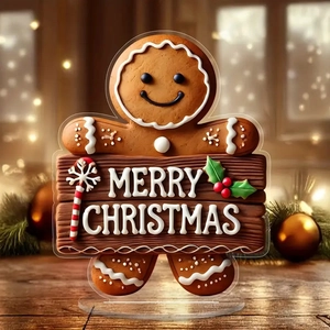 Gingerbread man acrylic desktop standee with Merry Christmas sign on wood table