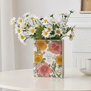 Creative book-shaped white ceramic vase with vintage floral patterns for tabletop decor