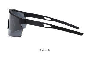 Close-up of matte black cycling sunglasses with hollowed-out arms and grey lenses