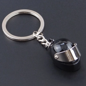 Creative black mini motorcycle helmet keychain with metallic visor and silver ring chain