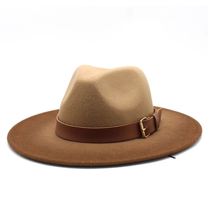 Detail view of the brown ombre gradient fedora hat with a leather band and gold buckle
