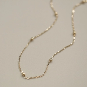 Elegant 14K gold-plated S925 sterling silver chain bracelet with polished gold beads