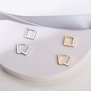 Minimalist square hoop earrings in gold and silver finish with fine pave zircon accents