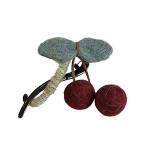 Elegant cherry hair claw clip featuring dark red wool yarn fruit and deep green leaves