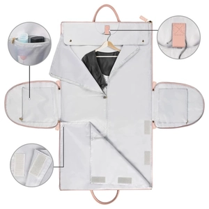Pink and grey foldable travel garment bag with waterproof lining and multi-compartment storage