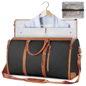 Black foldable travel garment bag with brown leather handles and suit hanging feature