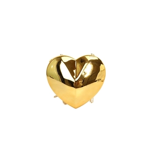 Elegant gold heart-shaped hard shell clutch bag with a polished mirror finish for women