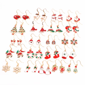 Christmas earring set featuring 21 pairs of colorful festive bells and snowflake charms