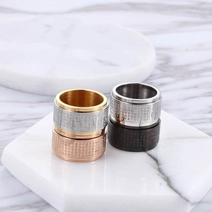 Buddhist spinning rings in gold, silver, rose gold and black titanium steel finishes