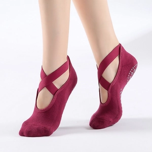 Burgundy cotton yoga socks with cross straps and non-slip grips for pilates and ballet