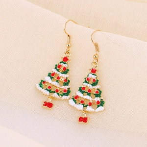 Festive gold Christmas tree drop earrings with colorful enamel and white snow accents