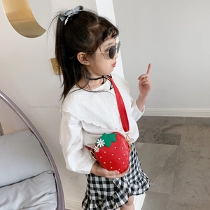 Cute strawberry shaped red crossbody bag with green leaves and rivet details for girls