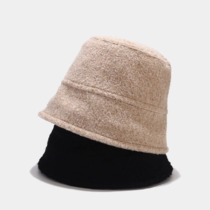 Minimalist beige and black textured sherpa bucket hats for autumn and winter outdoors