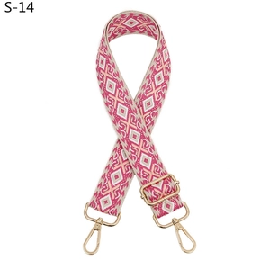 Adjustable woven shoulder strap with pink diamond pattern and gold metal lobster clasps