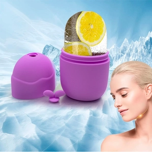 Detail of purple silicone face ice roller with lemon-infused ice for facial cooling care