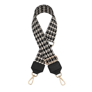 Adjustable houndstooth pattern wide shoulder strap with gold metal hooks and black PU leather