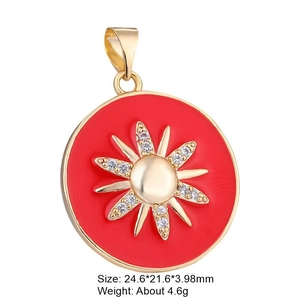 Gold sun pendant with red enamel and white zircon, size 24.6x21.6mm, weight 4.6g