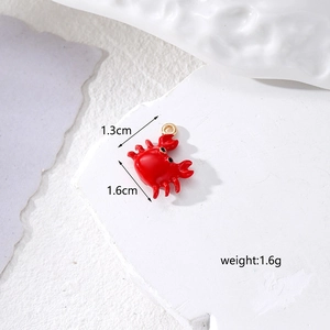 Detail view of red crab alloy pendant showing dimensions 1.6cm x 1.3cm and weight 1.6g