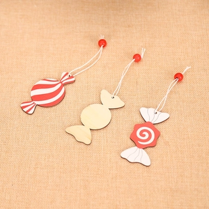 Set of 3 creative Christmas wooden candy ornaments with red spiral and wave patterns