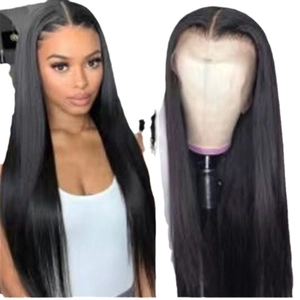 Long straight black synthetic wig with bangs for women shown on model and stand