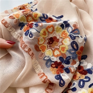 Ethnic summer sun protection beach shawl with colorful floral embroidery details