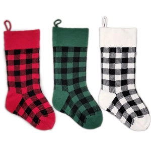 Set of three 18-inch knitted Christmas stockings in red, green and white plaid patterns