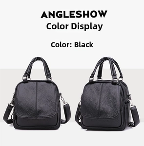 Detail of black lychee grain PU leather handbag with side zipper and detachable strap