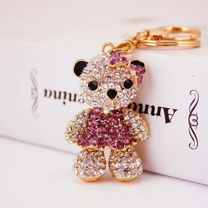 Sparkling crystal teddy bear keychain with purple dress on gold alloy base accessory
