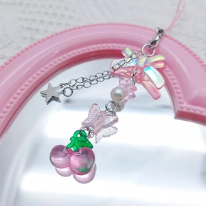 Sweet pink cherry phone charm with translucent butterfly and star pendant on mirror