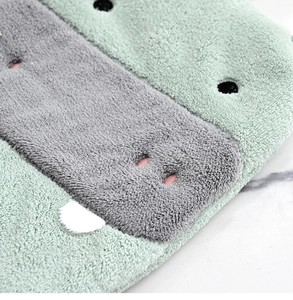 Close-up of cute cartoon animal coral fleece hand towel with ultra-absorbent plush texture