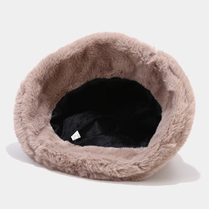 Pink plush faux fur bucket hat with warm lining and double pom poms for women