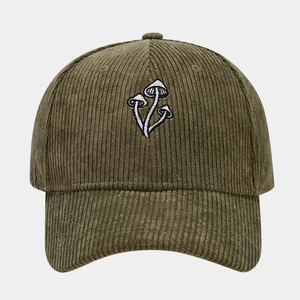 Close-up of olive green corduroy baseball cap with detailed white mushroom embroidery