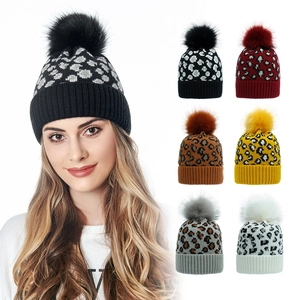 Women's leopard print knitted beanie collection with faux fur pom-pom in seven colors