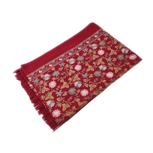 Red cashmere-feel shawl with elegant floral embroidery and tassel fringe details