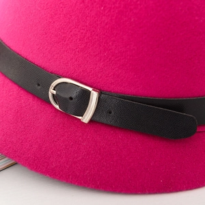 Elegant rose pink felt fedora with a black faux leather band and silver buckle detail