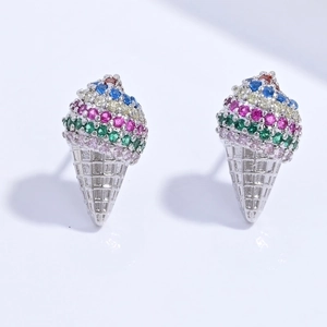 Close-up of ice cream cone stud earrings with colorful crystal stones and silver texture