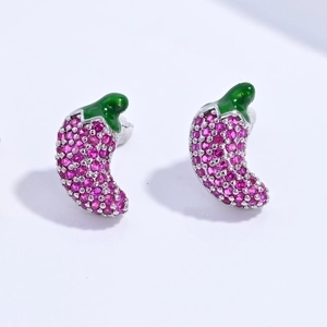 Macro shot of silver eggplant stud earrings with pink pavé stones and green enamel leaves
