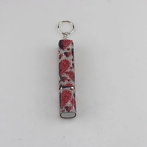 Refillable 10ml diamond-encrusted perfume bottle keychain with red and purple rhinestones