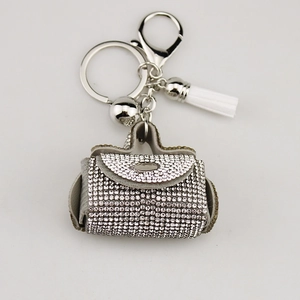 Fashionable sparkling rhinestone handbag keychain with white tassel and silver lobster clasp